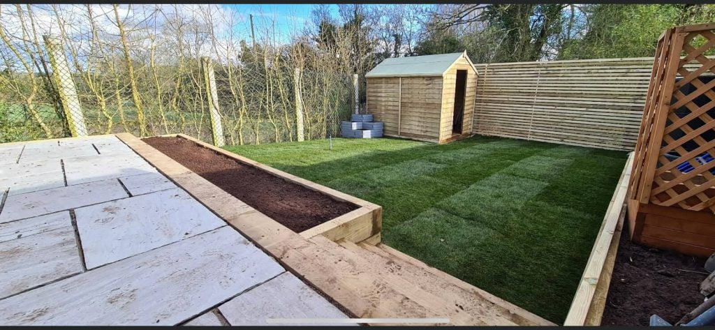 Lawn, patio and plant bed, with an upper level