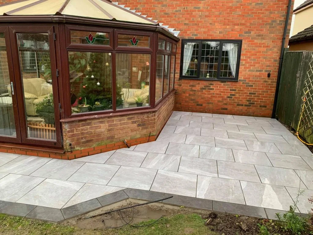 Porcelain patio around a conservatory