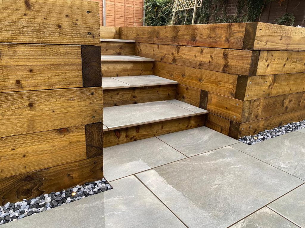 Porcelain floor, gravel border, treated plant bed
